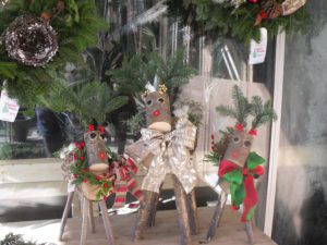 A group of reindeer sitting on top of a table.