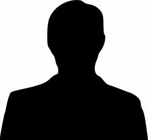 Silhouette of a person in suit.