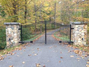 Elegant stone and iron gate design
